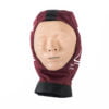 CPR training manikin head with maroon cover.