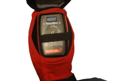 Rescue manikin with ShoutBox communication device on head.