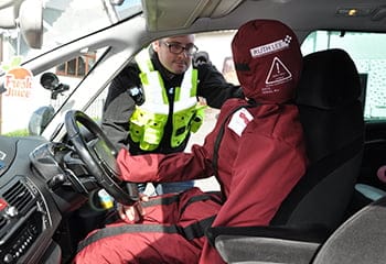 Duty Plus manikin in car
