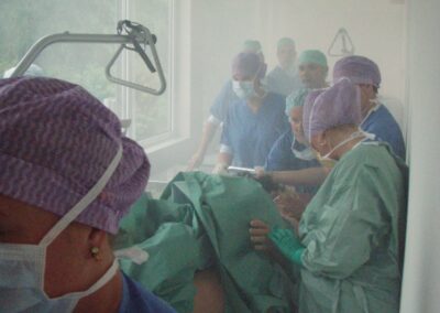 Medical team working in smoke-filled room