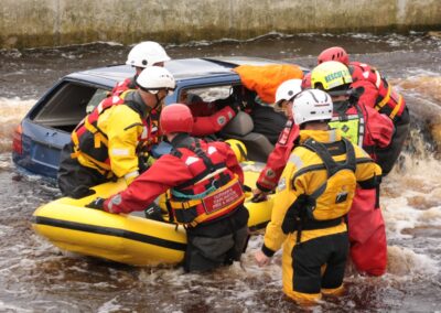 Water rescue team assists in vehicle flooding