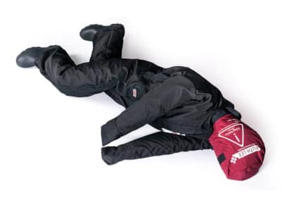 Rescue training dummy in recovery position.