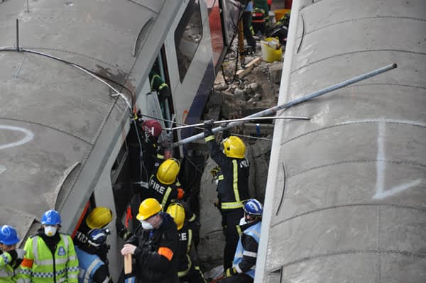 Emergency responders at train crash site.