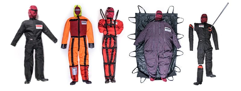 Various rescue training manikins in different outfits.