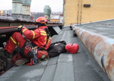 Rescue worker on a roof during an emergency operation.
