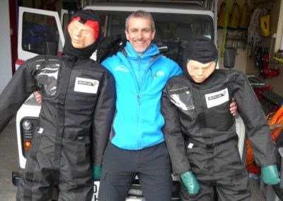 Mountain Rescue team member with training dummies.