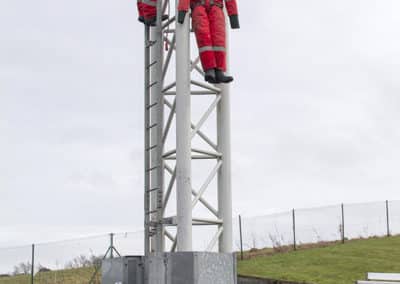 Rescue training exercise on a telecommunications tower.