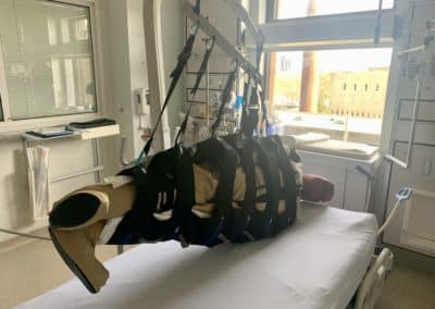Patient lift sling in hospital room.