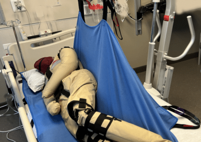 safe patient handling manikin and sling