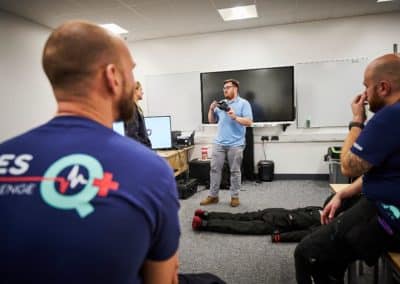 First aid training session with a VR CPR demonstration